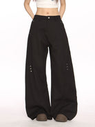 BIGGOLD STUDIO Deconstructed Curved Seam Trousers in Black - On Female Model