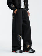 MEDM Leopard Leather Patch Drawstring Pants in Black - On Male Model