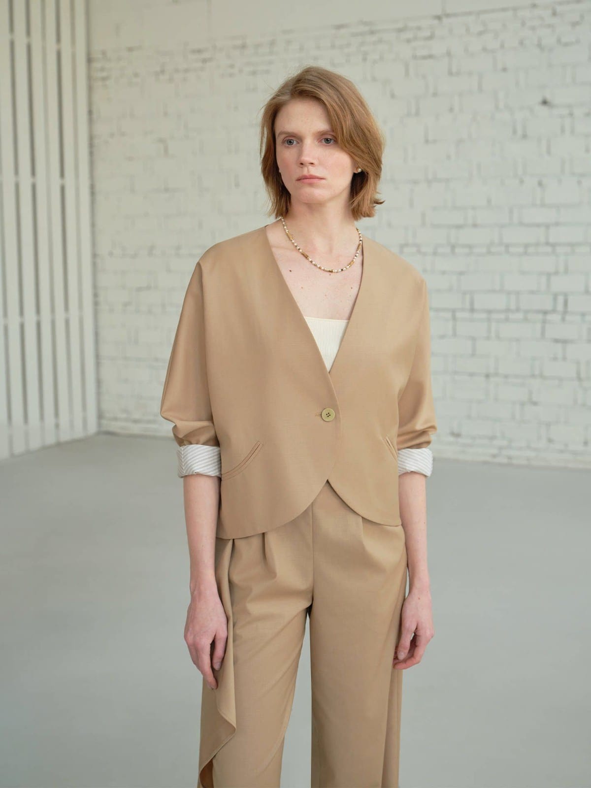 TEASEL Scalloped Edge Wool Blend Cropped Blazer in Beige - On Female Model