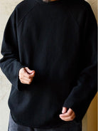 USAGE Slub Cotton Raglan Sweatshirt in Black - On Male Model