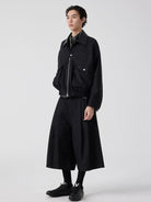 SIMPLE PROJECT Cotton Pleated Cropped Shorts in Black - On Male Model