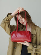 PANLULUPAN Oil Wax Leather Pillow Shoulder Bag in Beige - On Female Model