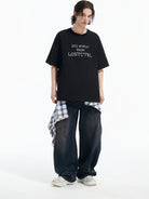 LOSTCTRL Cross Stitch Letter T Shirt in Black - On Male Model
