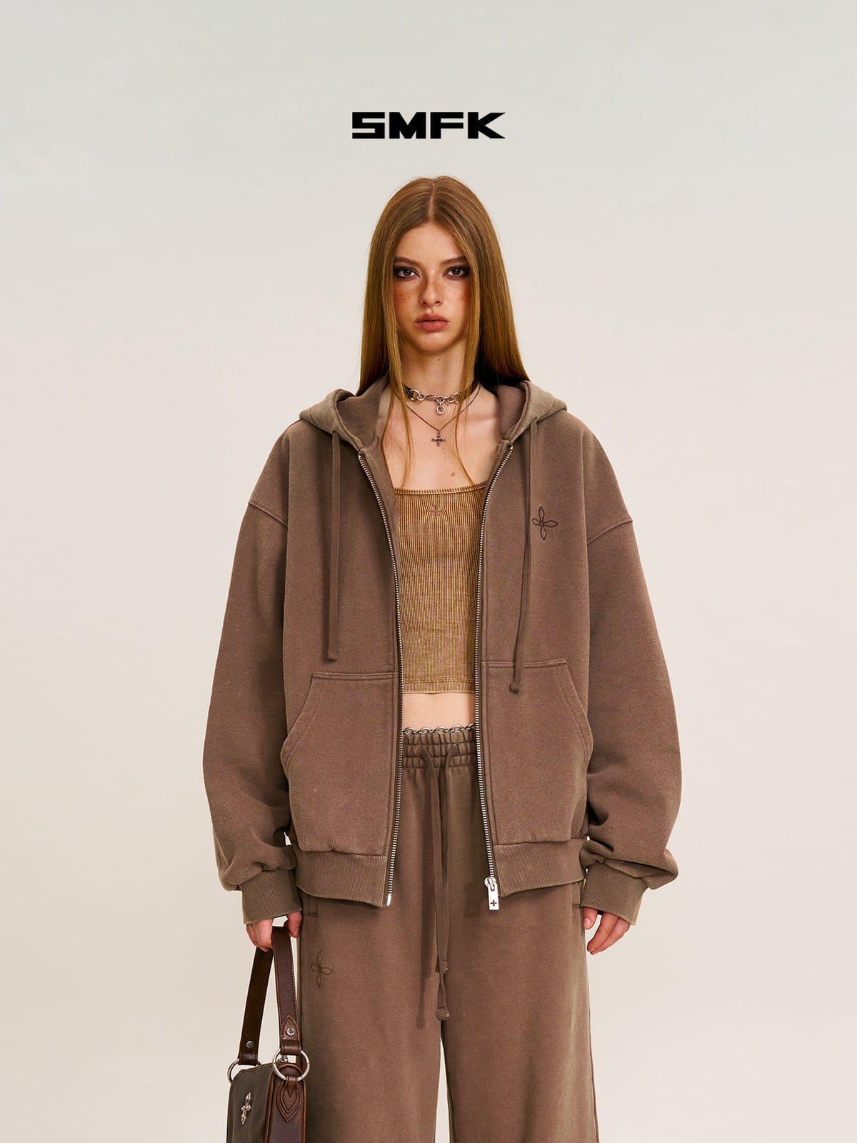 SMFK Cross Embroidered Zip Up Hoodie in Brown - On Female Model