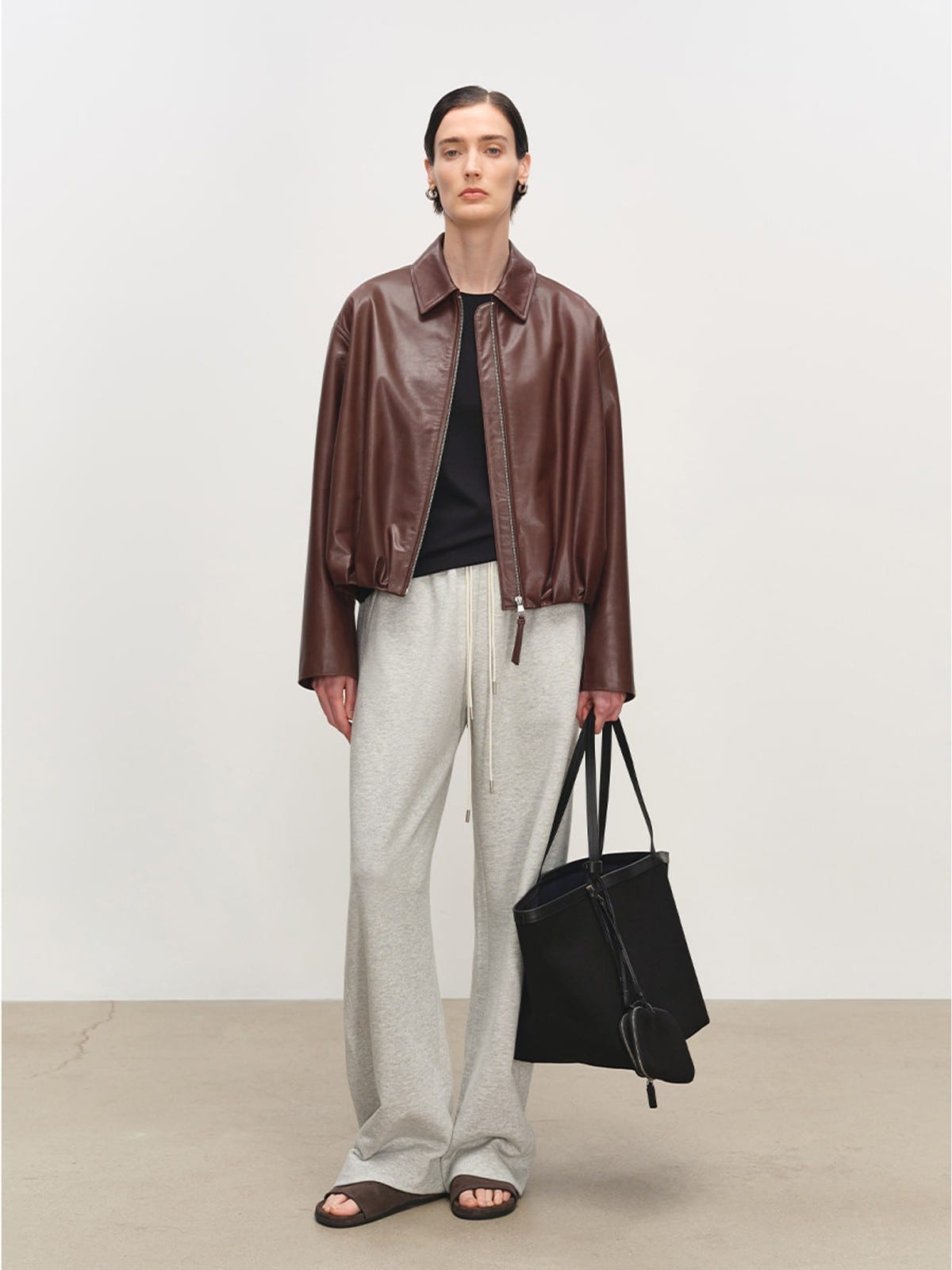MSBEAST Gathered Hem Sheep Leather Jacket in Brown - On Female Model