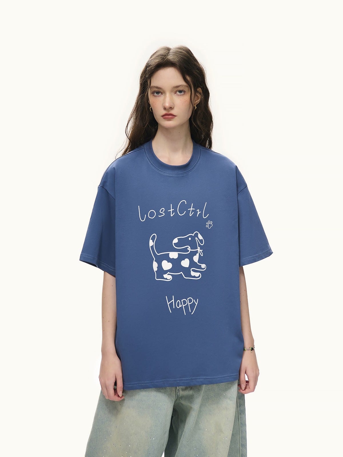 LOSTCTRL Spotted Dog Graphic Crewneck T Shirt in Blue - On Female Model