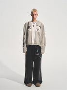 BASTARD Washed Applique Zip Up Hoodie in Gray - On Male Model