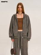 SMFK Distressed Washed Cotton Zip Up Hoodie in Dark Gray - On Female Model