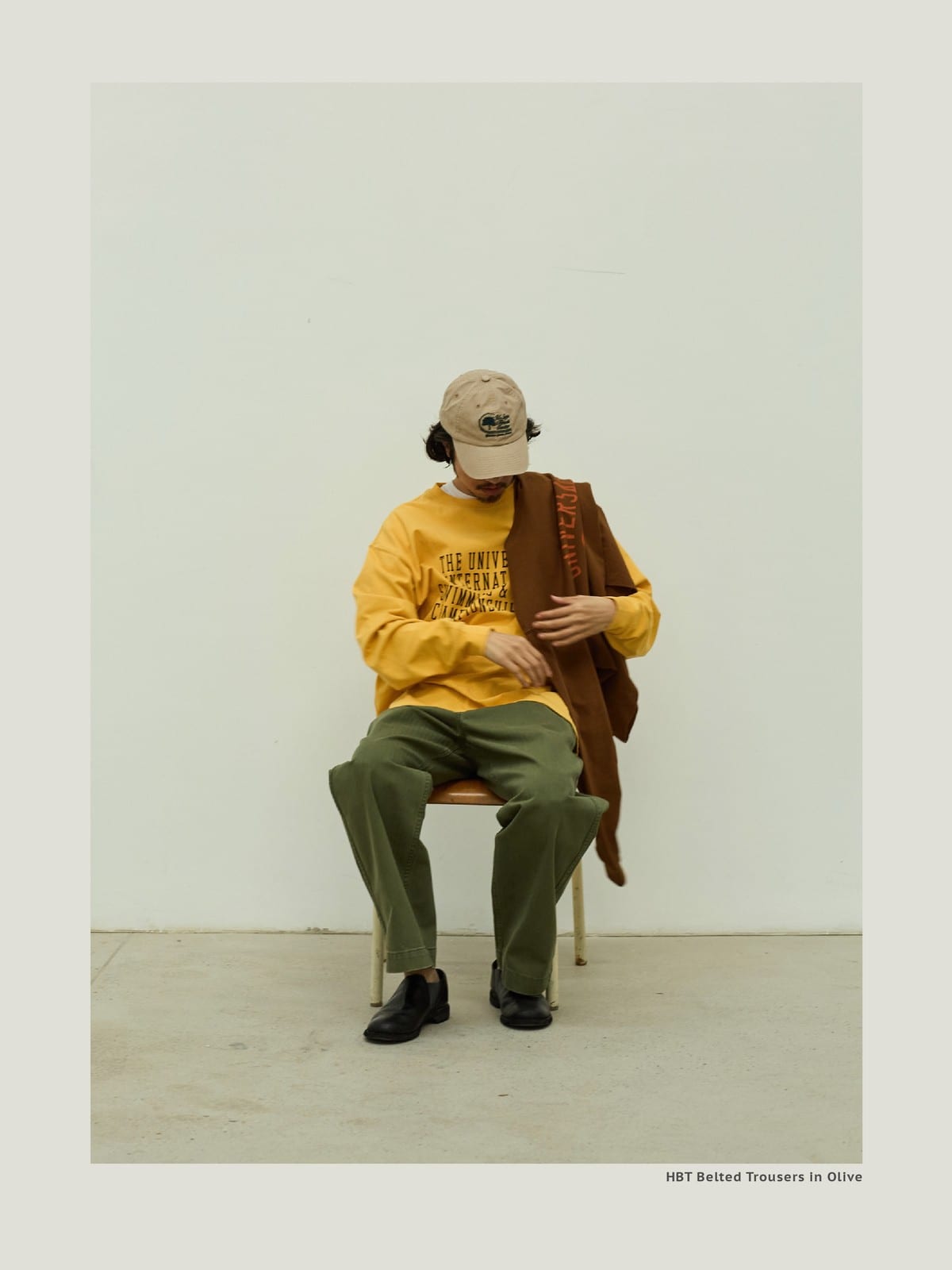 USAGE Heavyweight Herringbone Twill Belted Trousers in Olive - On Male Model