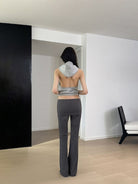 RARELY ALIKE Low Rise Layered Flared Yoga Pants in Gray - On Female Model