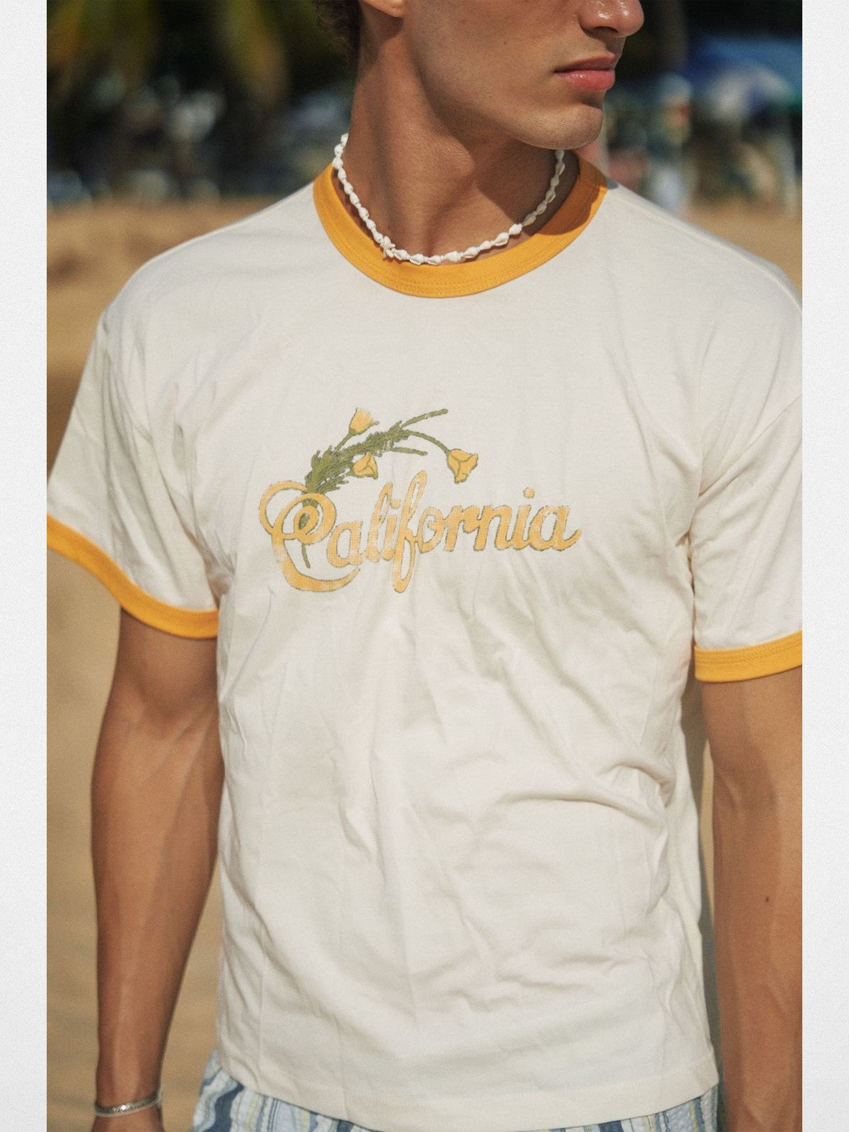 Retro 21 California Graphic Ringer T Shirt in Cream - On Male Model