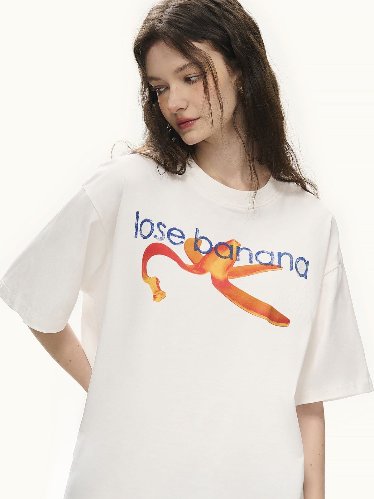 LOSTCTRL Distressed Banana Print Sorona T Shirt in White - On Female Model