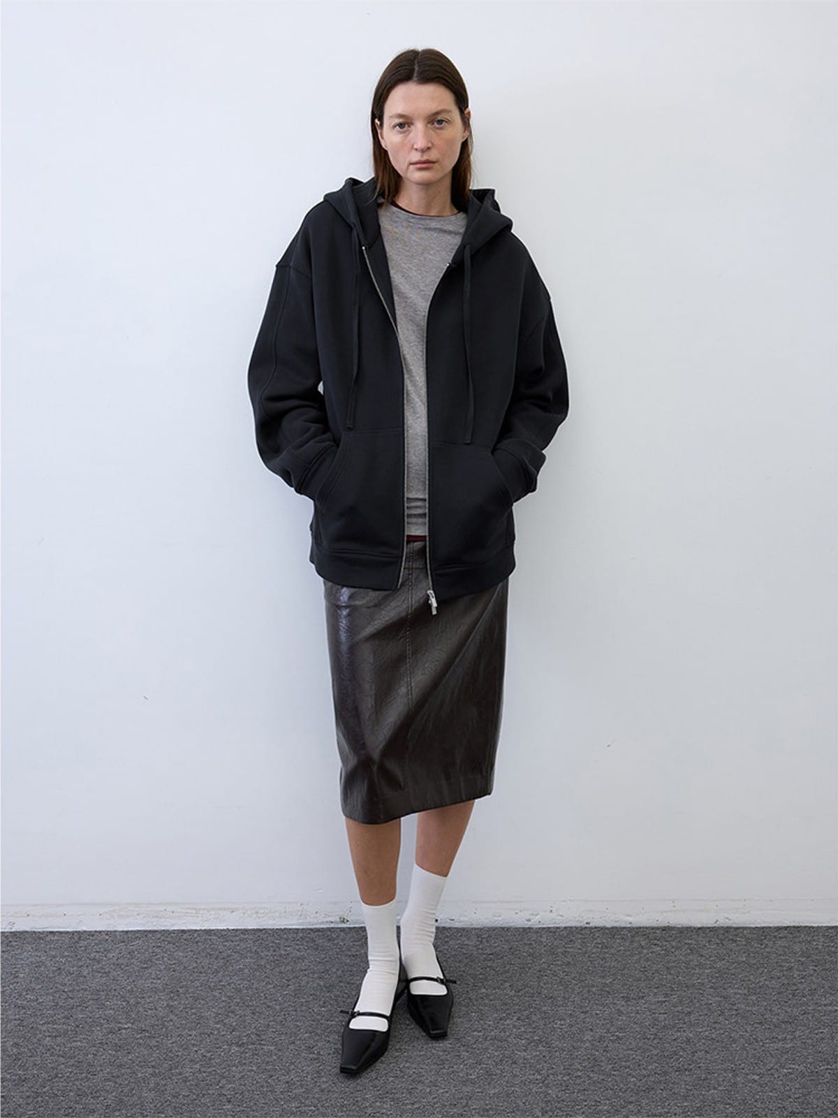 Random Piece Cotton Lyocell Zip Up Hoodie in Black - On Female Model