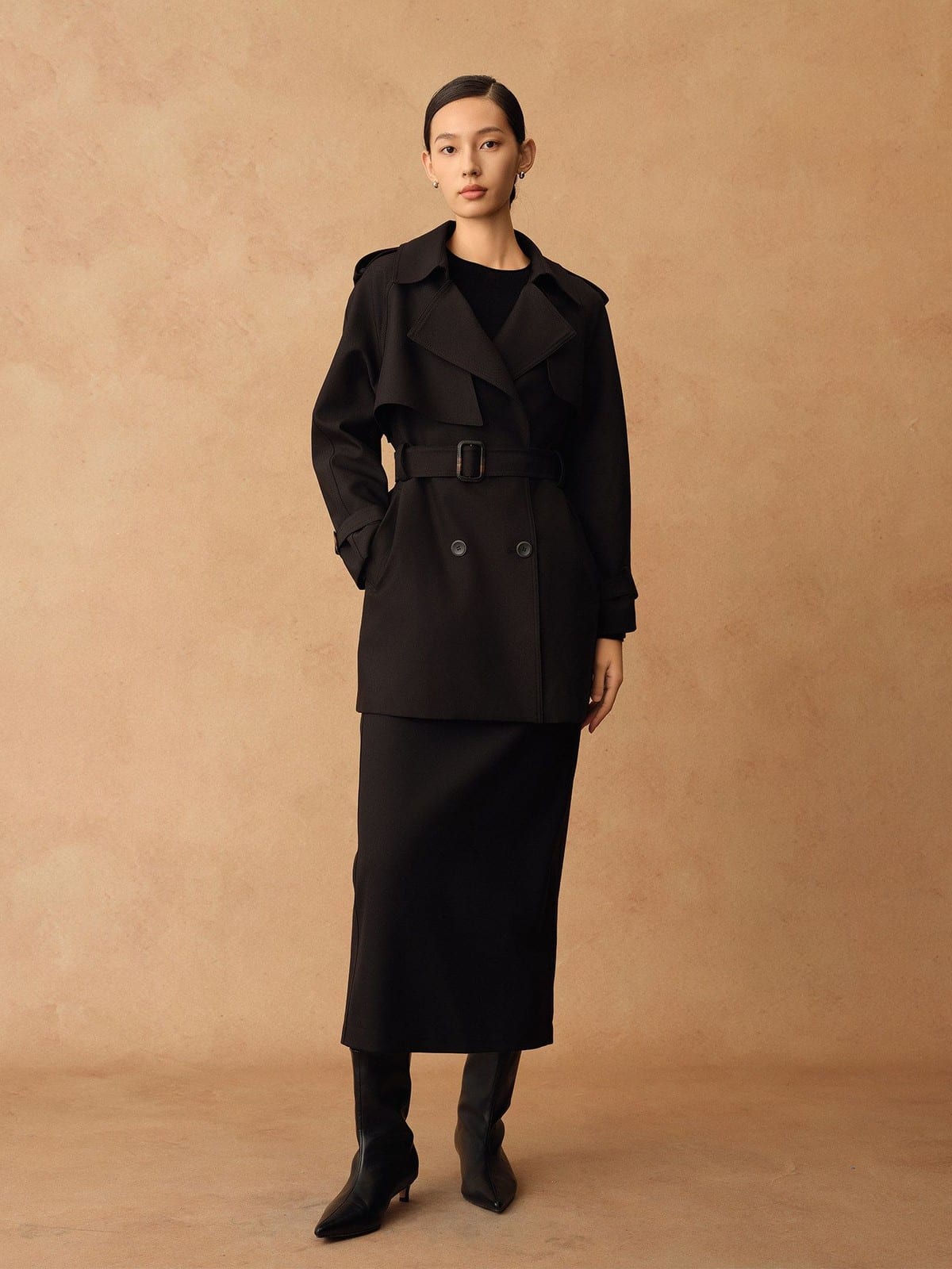 TEASEL Double Breasted Belted Trench Coat in Black - On Female Model