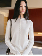TEASEL Worsted Wool Mock Neck Cardigan in Cream - On Female Model