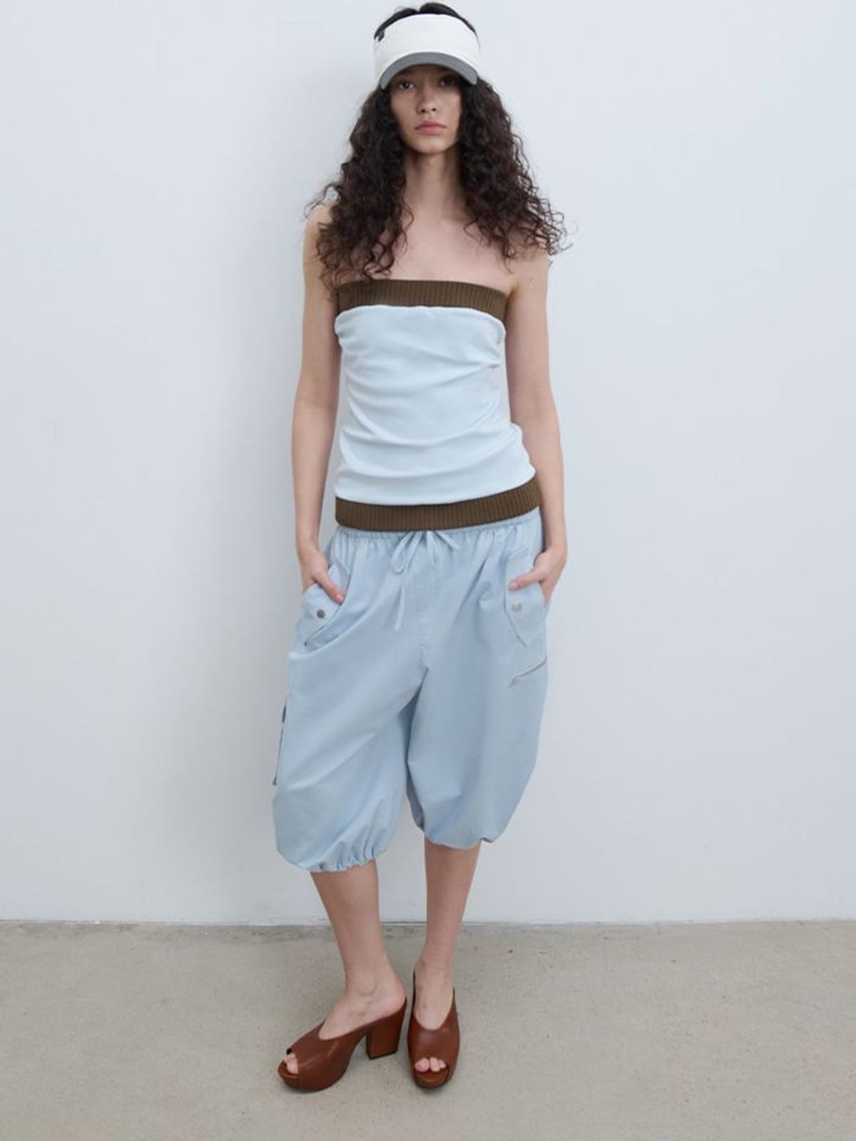 RARELY ALIKE Cropped Cotton Lantern Cargo Shorts in Sky Blue - On Female Model