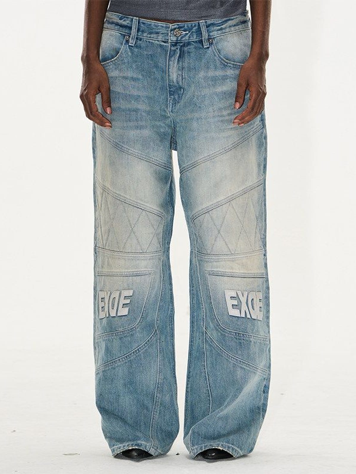 BLINDNOPLAN Paneled Embroidered Distressed Denim Pants in Blue - On Model