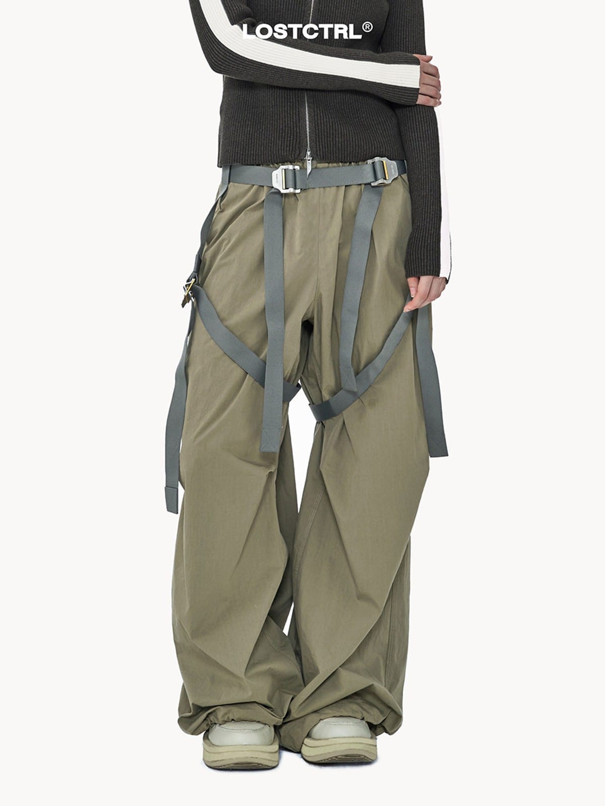 LOSTCTRL Strapped Wide Leg Parachute Pants in Green - On Model