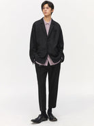 SIMPLE PROJECT Center Seam Cropped Trousers in Black - On Male Model
