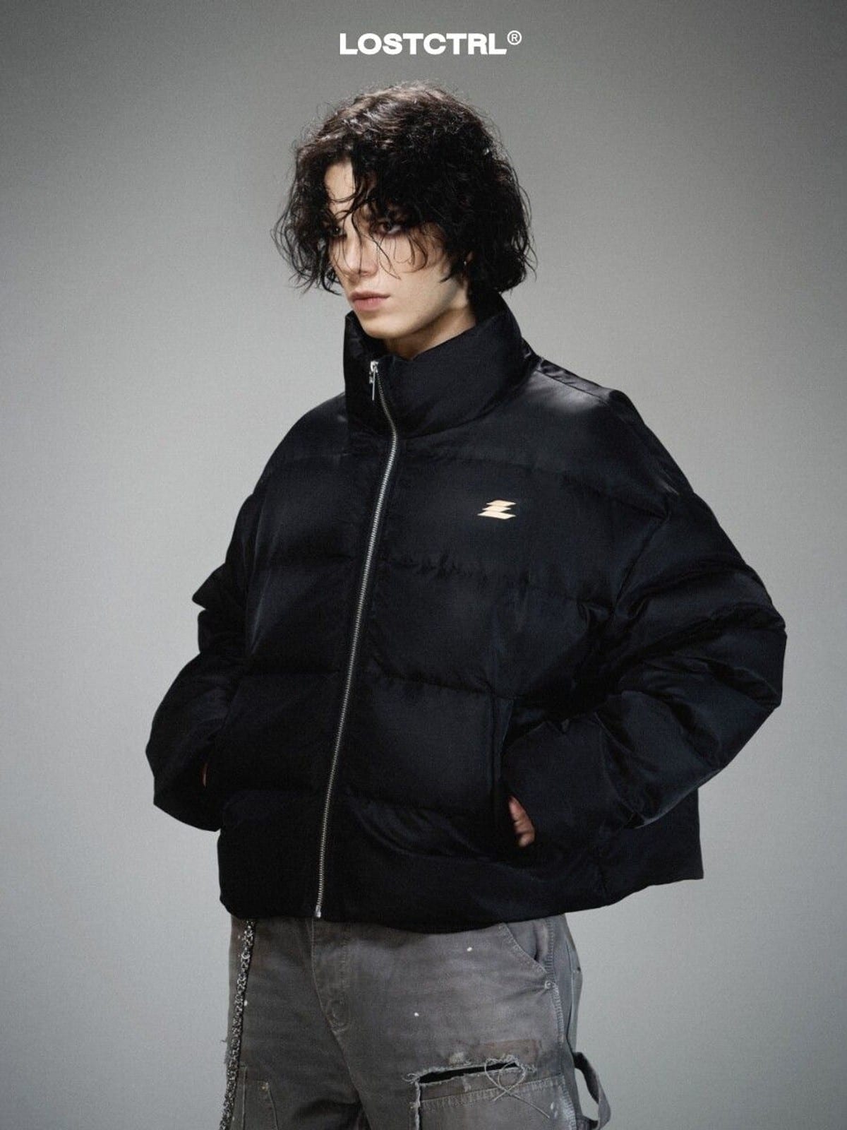LOSTCTRL Minimalist Nylon Puffer Jacket in Black - On Model