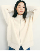 TEASEL Merino Wool Boucl Zip Cardigan in White - On Female Model