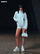 SMFK Asymmetric Zip Cotton Track Jacket in White - On Female Model