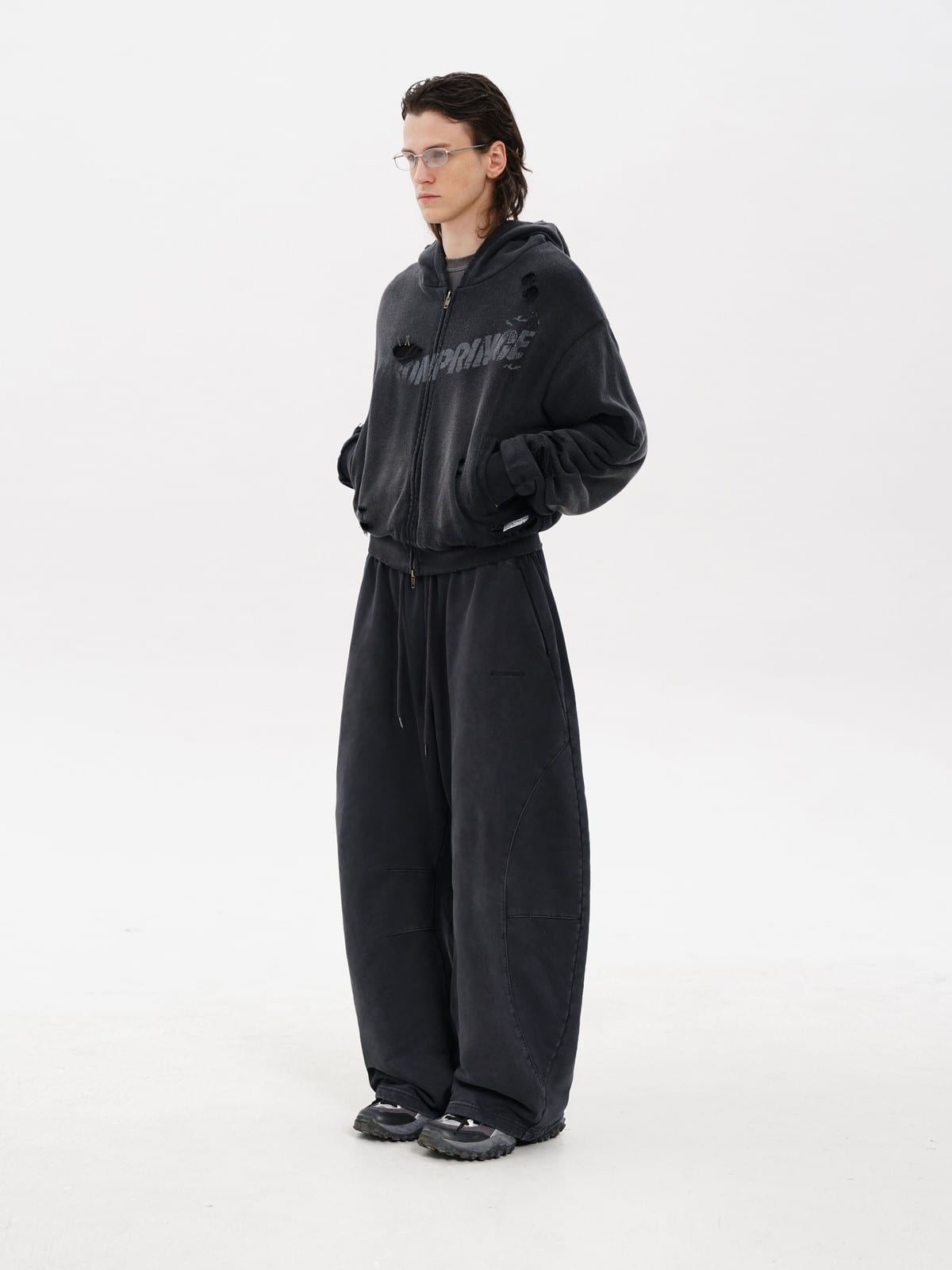 MASONPRINCE Double Layered Cotton Joggers in Black - On Male Model