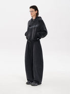 MASONPRINCE Double Layered Cotton Joggers in Black - On Male Model