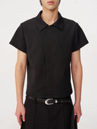JCAESAR STUDIO Asymmetric Concealed Button Short Sleeve Shirt in Black - On Male Model