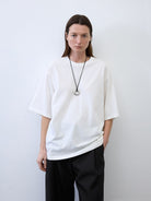 Random Piece Cotton Drop Shoulder T Shirt in White - On Female Model