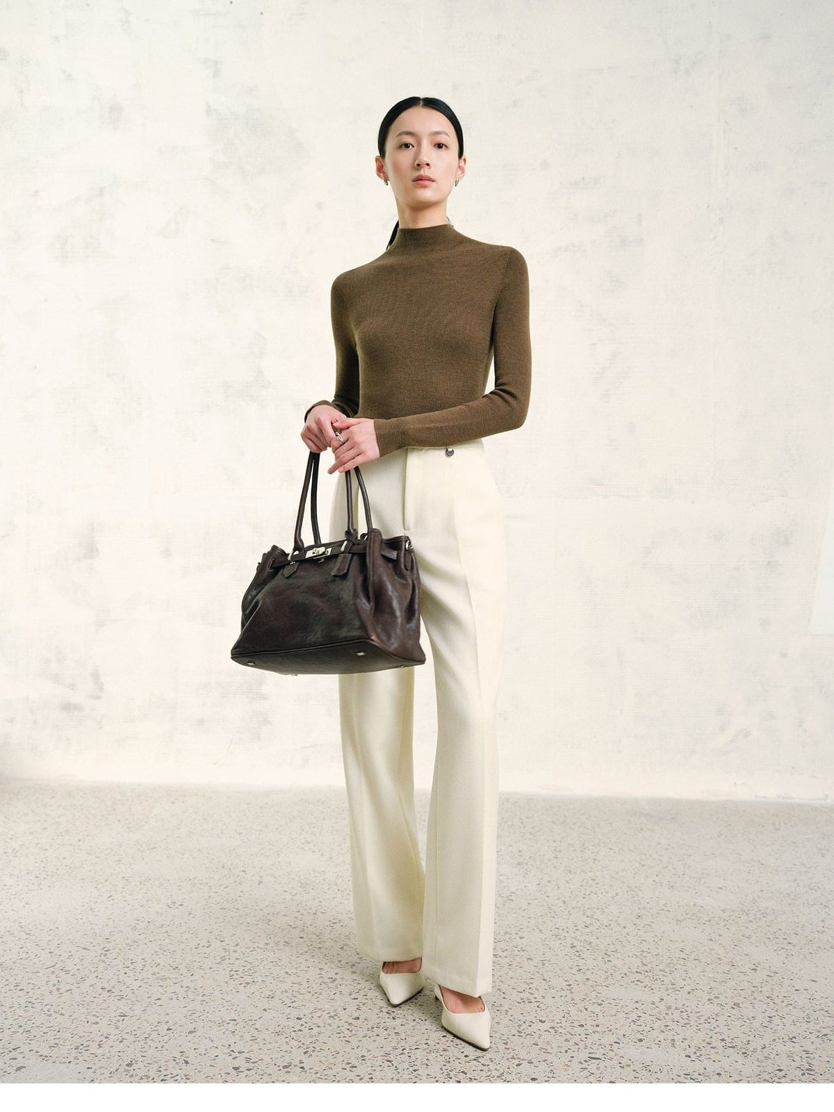 TEASEL Textured Wool Pleated Trousers in Cream - On Female Model