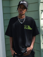MEDM Half Sleeve Cotton Logo T Shirt in Black - On Male Model