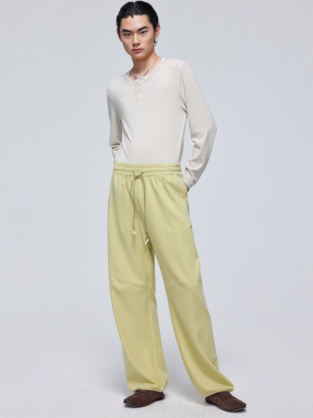 SIMPLE PROJECT Wooden Bead Drawstring Sweatpants in Mint - On Male Model