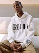 MEDM Animal Print Logo Pullover Hoodie in White - On Male Model