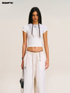 SMFK Short Sleeve Cropped T Shirt in White - On Female Model