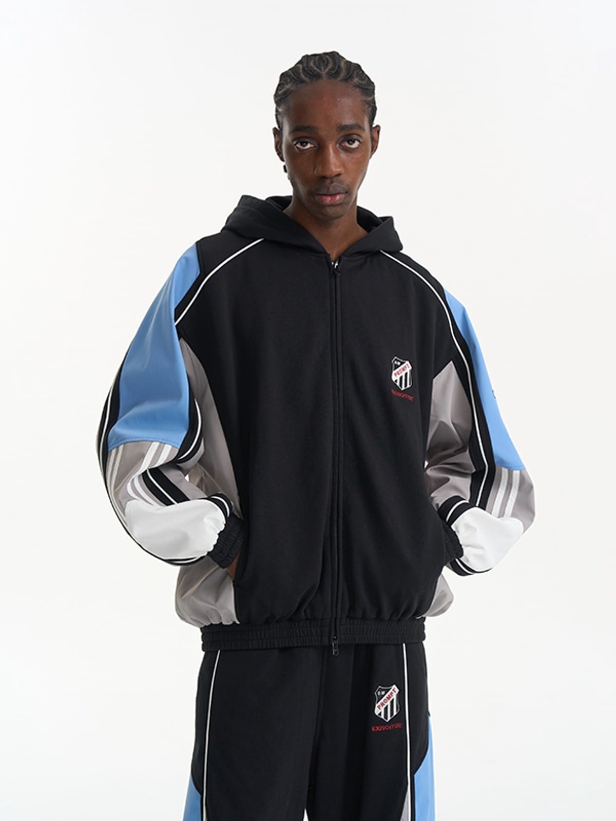 BLINDNOPLAN Color Blocked Hooded Track Jacket in Black - On Male Model