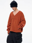 D5ove Distressed V Neck Fleece Sweatshirt in Orange - On Male Model
