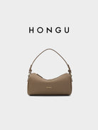 HONGU Leather Crossbody Pillow Bag in Beige