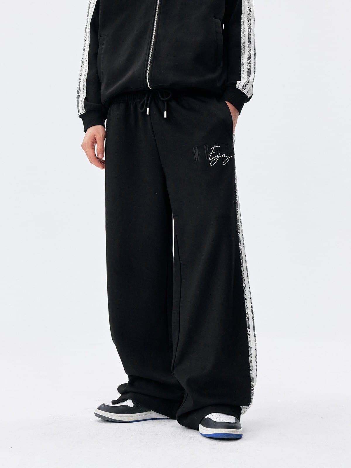 MEDM Lace Paneled Striped Track Pants in Black - On Model