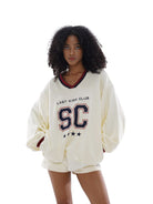 SweetChilling Embroidered V Neck Rugby Sweatshirt in Yellow - On Female Model