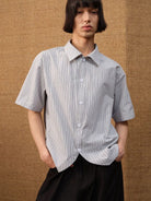JCAESAR STUDIO Striped Short Sleeve Curved Hem Shirt in Gray - On Male Model