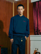 SOD Embroidered Padded Shoulder Hoodie in Blue - On Male Model