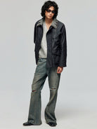 SIMPLE PROJECT Distressed Vintage Wash Flare Jeans in Blue - On Male Model