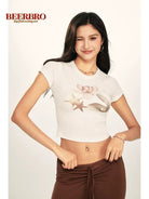 BeerBro Realistic Shell Print Baby Tee in White - On Female Model