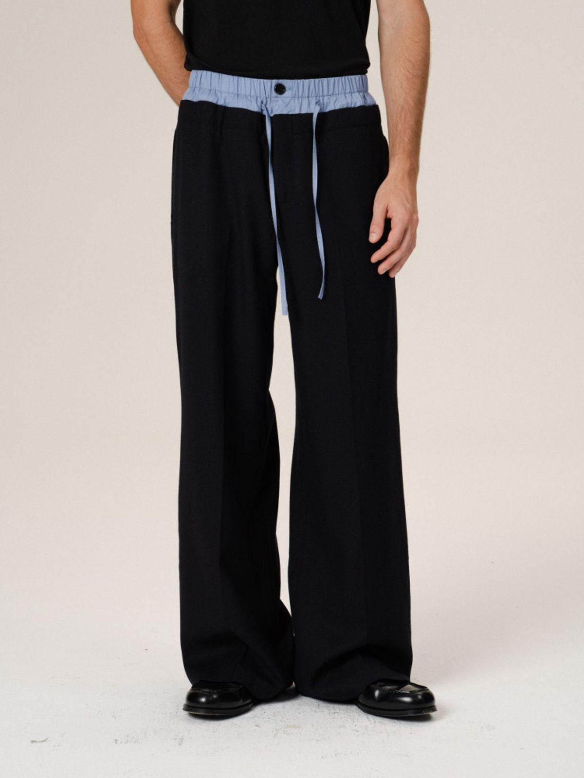 Retro 21 100 Italian Wool Double Waistband Trousers in Black - On Male Model