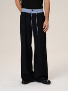 Retro 21 100 Italian Wool Double Waistband Trousers in Black - On Male Model
