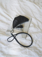 PANLULUPAN Pebbled Leather Croissant Coin Purse in Green
