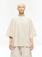 D5ove Boxy Mock Neck Cotton T Shirt in Beige - On Male Model