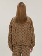 LOSTCTRL Vintage Monogram Track Jacket in Beige - On Model