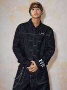 MEDM Embroidered Cuff Raw Denim Jacket in Blue - On Male Model